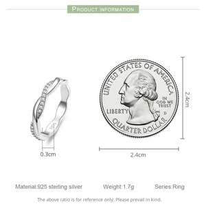 Detailed size comparison of 925 sterling silver twisted ring with a quarter coin