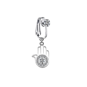 Macro detail of silver Hamsa Hand clip-on body jewelry with sparkling zircon stones