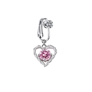 Detail of silver clip-on navel ring featuring a pink heart stone and zircon frame