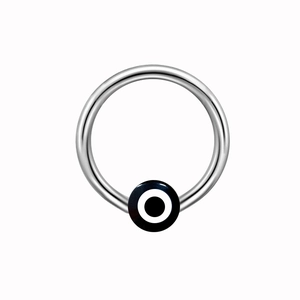 Close-up of polished silver captive bead ring featuring a blue evil eye lucky charm bead