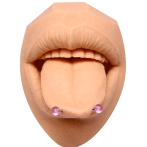 Modèle buccal en silicone détaillé pour pratique du piercing de langue avec haltère rose