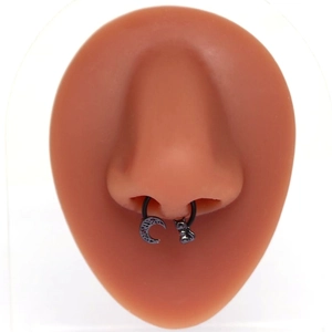 Black punk septum nose ring with crescent moon and cat pendants on silicone model
