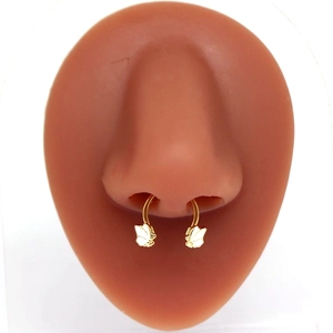 Punk butterfly horseshoe nose ring in gold finish on realistic display model
