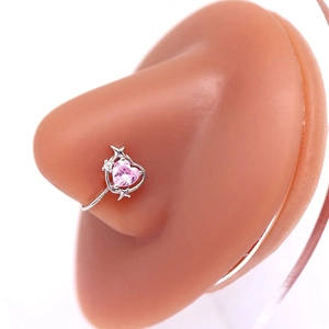 Detailed view of heart-shaped pink zircon nose ring on silicone nose model for non-pierced use
