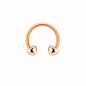 Rose gold punk horseshoe nose ring with polished heart charms on a white background