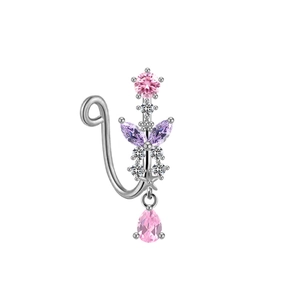Detail view of silver U-shaped fake nose ring with purple zircon butterfly and pink droplet