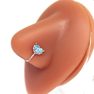 Minimalist heart-shaped blue opal nose ring clip on a realistic display model