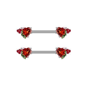 Detail view of silver nipple rings with heart-shaped red gems and floral enamel designs