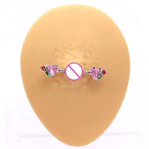 Detailed close-up of pink heart zircon nipple rings with enamel rose flower decorations