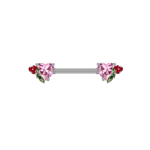 Detailed macro of silver nipple ring with pink heart zircons and floral enamel decor