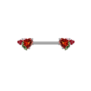 Macro detail of heart-shaped red zircon nipple ring with enamel flower and leaf accents