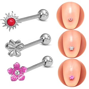 Trois piercings de langue en acier avec des motifs de papillon, soleil et fleurs