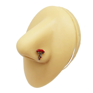 Detailaufnahme eines roten Lippen-Nasenrings mit einem Rubin-Zirkon-Anhänger