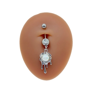 Detailed view of silver belly ring featuring fluid metal design and white opal bead