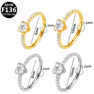 Detailed views of F136 titanium heart opal rings with pave cubic zirconia in 8mm and 10mm