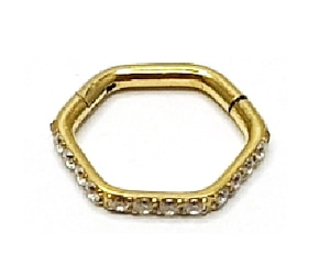 Macro shot of gold-plated hexagonal clicker hoop ring with sparkling white zircons