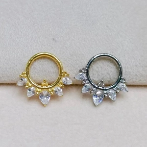 F136 titanium clicker nose rings in gold and silver with teardrop cubic zirconia stones