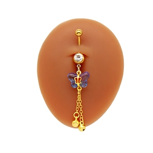 Detail of blue acrylic butterfly belly ring with gold chains and small hanging bells
