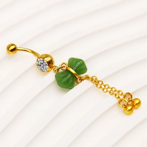 Gold belly button ring featuring a green butterfly pendant and elegant long tassel chains