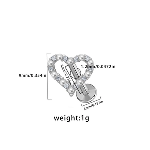 Detailed view of heart-shaped labret stud with pearls and cubic zirconia stones