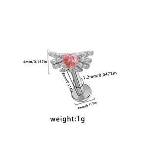 Macro view of winged heart labret stud with pink zircon and exact dimensions