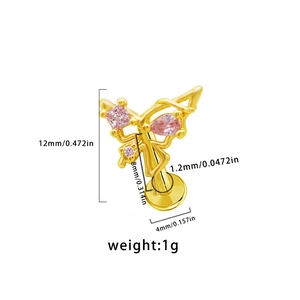 Detailed macro view showing dimensions of golden butterfly labret stud with pink zircon
