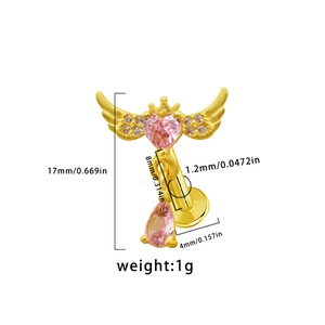Detail showing gold heart wing labret with pink zircon and size measurements