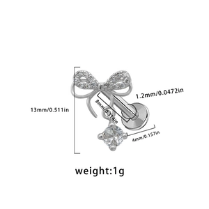 Detailed view of butterfly labret stud with zircon stones and 13mm height measurements