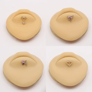 Selection of stainless steel butterfly and heart labret studs with colorful zircon