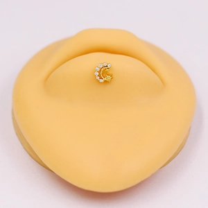 Golden crescent moon and star belly button ring with sparkling zircon stones