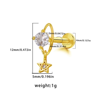 Detailed view of golden labret stud with zircon stone and star-shaped hanging pendant