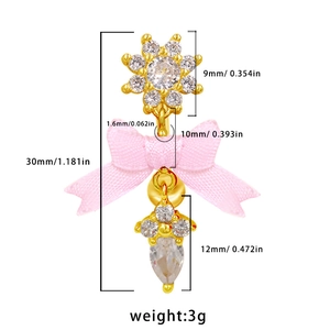 Dimensiones detalladas del piercing de ombligo dorado con lazo y circón en gota