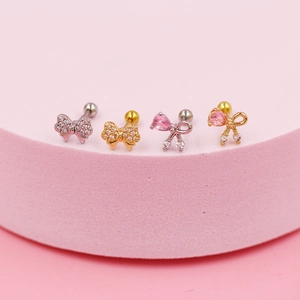 Set de pendientes de lazo con circonita rosa y colgantes en acabado oro y plata