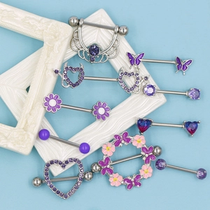 Paarse tepelpiercing set van roestvrij staal met vlinder en hart zirkonia designs