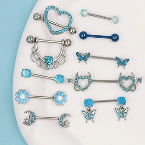 Set piercing capezzolo con cuore blu e farfalla in acciaio inossidabile e zirconi