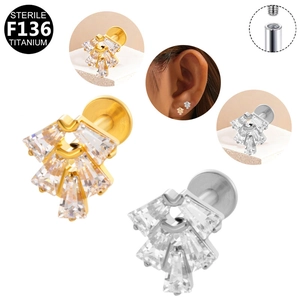 Titanium fan shaped labret stud with five baguette zircons in gold and silver finish