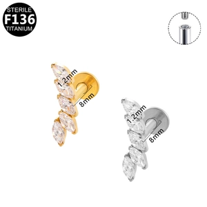 Detail view of F136 titanium stud with marquise zircon leaves and flat back design