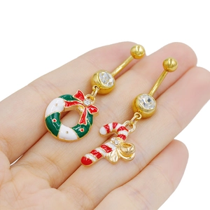 Piercings de ombligo navideños con colgantes de corona y bastón de caramelo dorados
