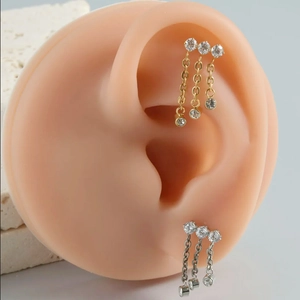 F136 titanium tassel chain earrings with triple cubic zirconia studs and hanging chains