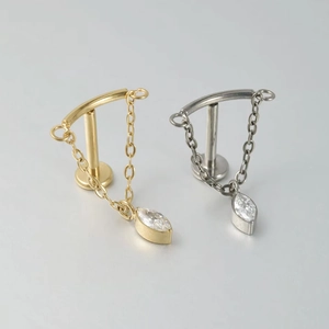 G23 titanium labret stud with marquise zircon chain dangle in gold and silver finish