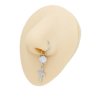 Detail of silver stainless steel nose ring with zircon stone and hanging cross pendant