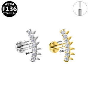 Macro detail of F136 titanium snowflake lip stud with zircons and threaded pin