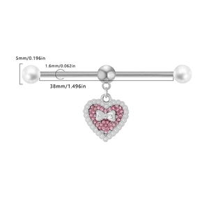 Detail of 38mm industrial barbell with pink heart pendant and small silver bow