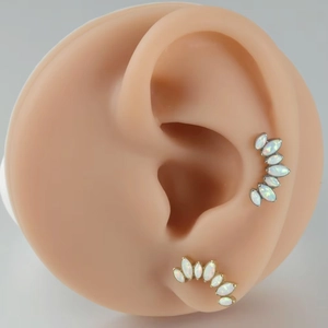 G23 Titanium labret stud featuring opal fire stones in marquise cut arrangement