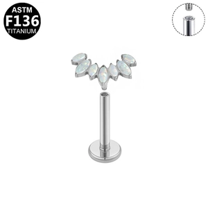 Macro detail of F136 titanium labret stud with fan-shaped marquise white opal inlay