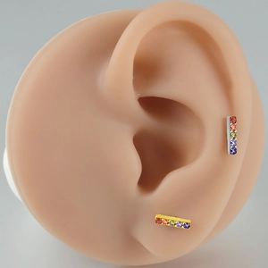 Rainbow G23 titanium lip stud with multi-color cubic zirconia in silver and gold tone
