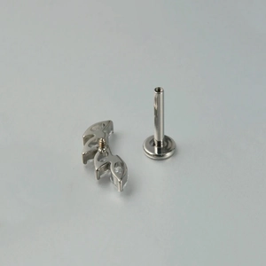 G23 titanium labret piercing with marquise cut zircon stones and internal thread design