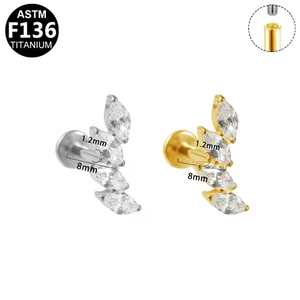 Detailed view of ASTM F136 titanium labret studs with marquise zircon leaf design