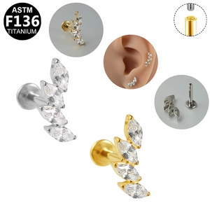 Close-up of G23 titanium marquise CZ stud featuring internal threading and dual finishes
