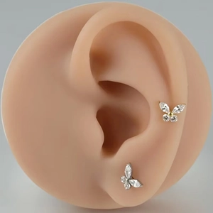 F136 titanium butterfly stud earrings with marquise zircon stones in gold and silver